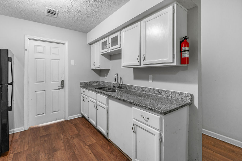 Kitchen counter run with double sink and fire extinguisher